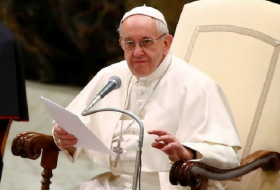 Pope says `at peace` confronting Vatican corruption, sex abuse 
